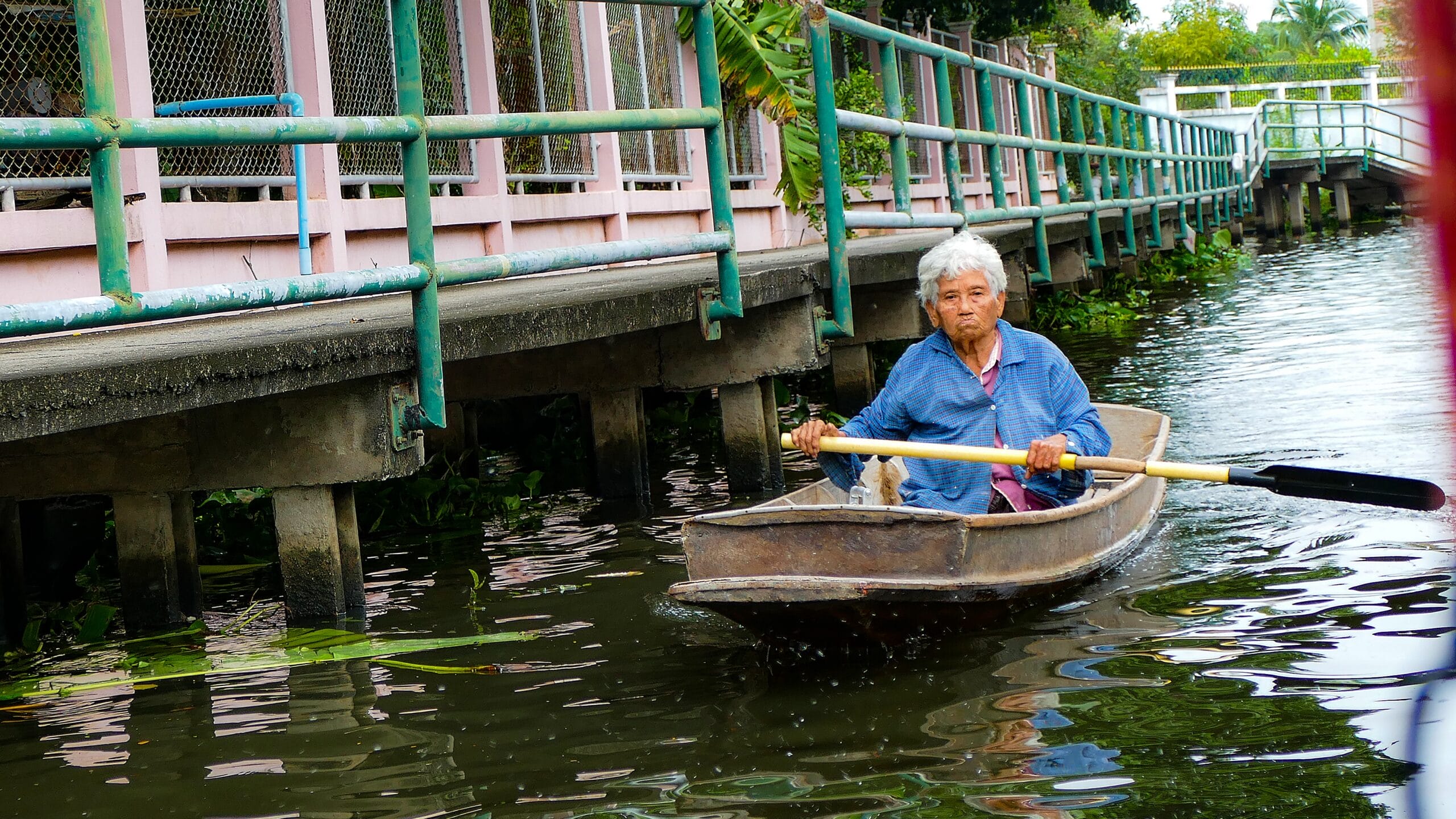 Bangkok canals orchid farm Thonburi khlong scene