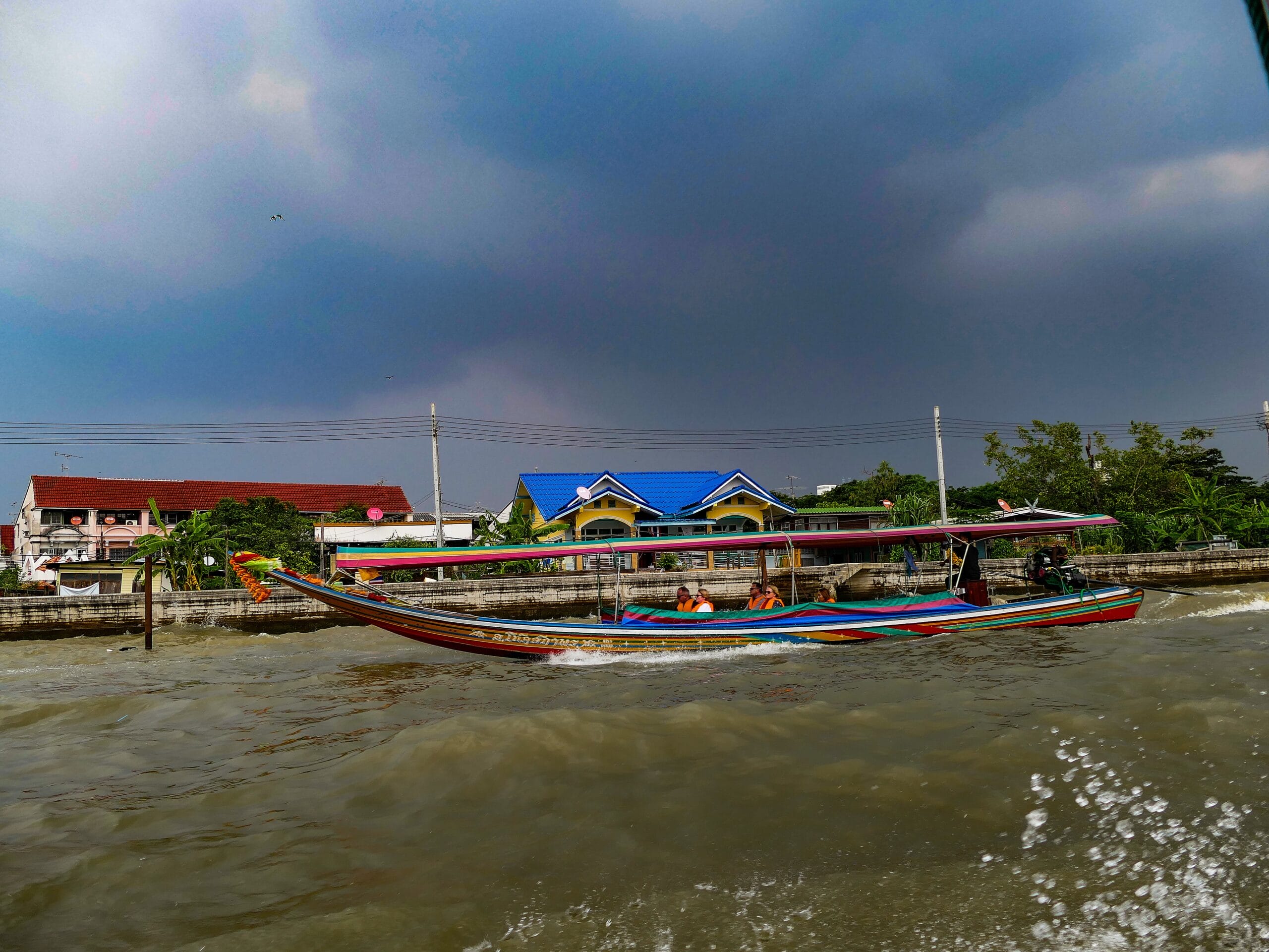 Bangkok canals orchid farm Thonburi khlong scene