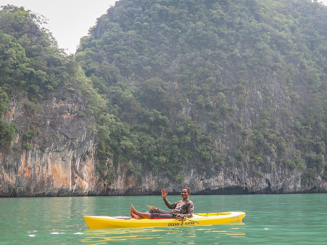Sea kayaking beneath limestone cliffs in Phang Nga Bay